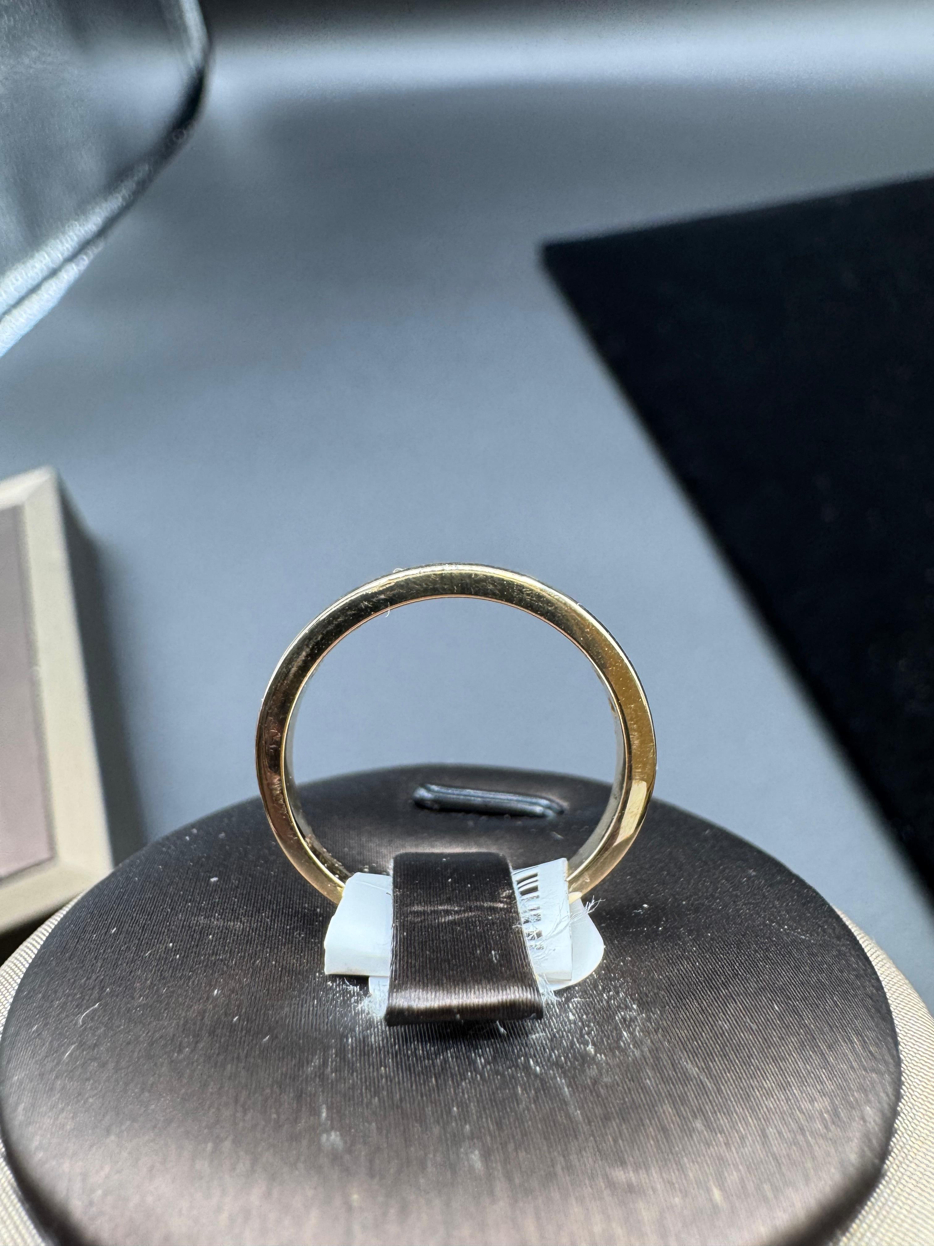 14KT Yellow Gold 0.52CT Diamond Band.