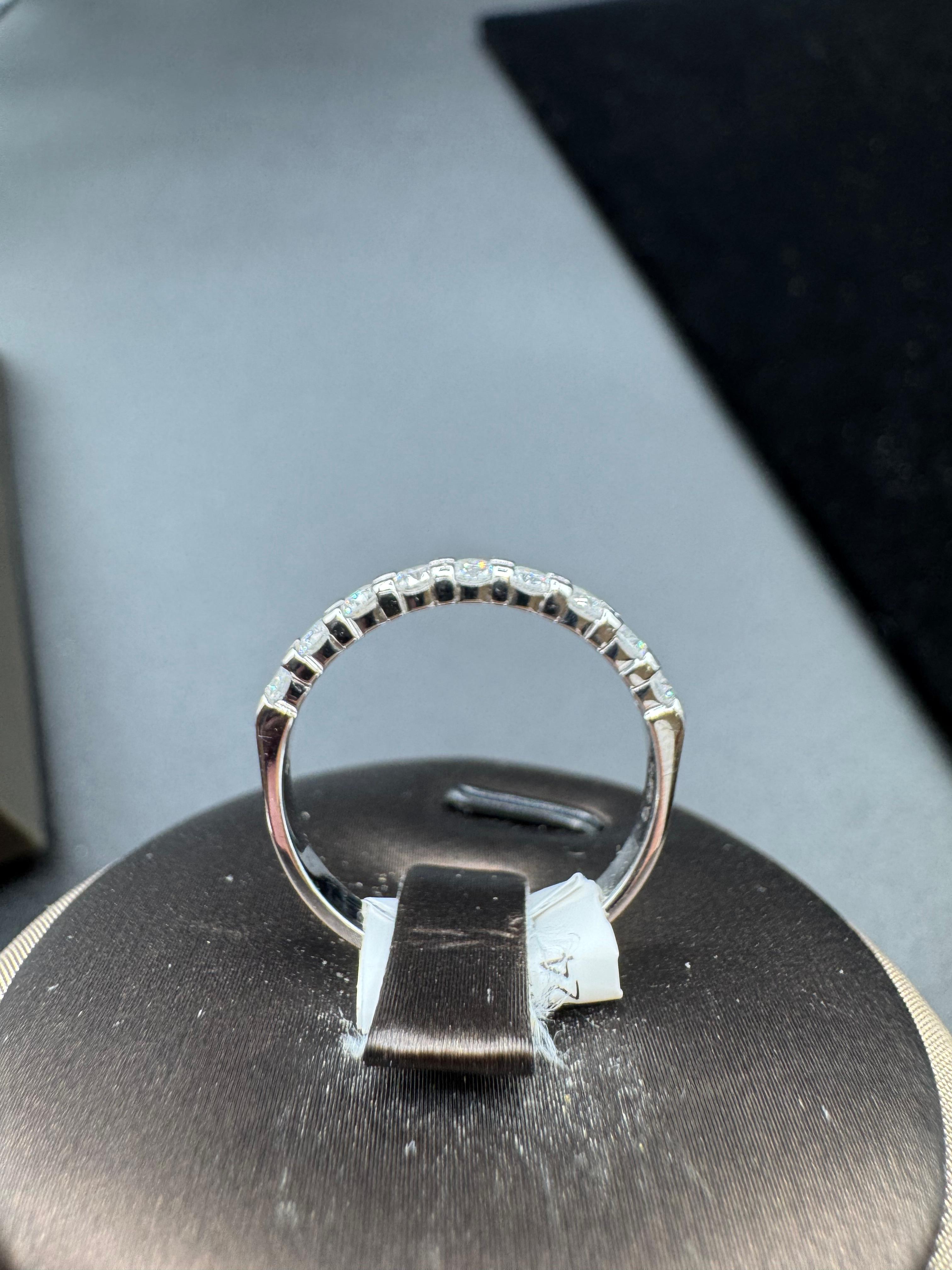 14KT White Gold 0.53CT Diamond Band.
