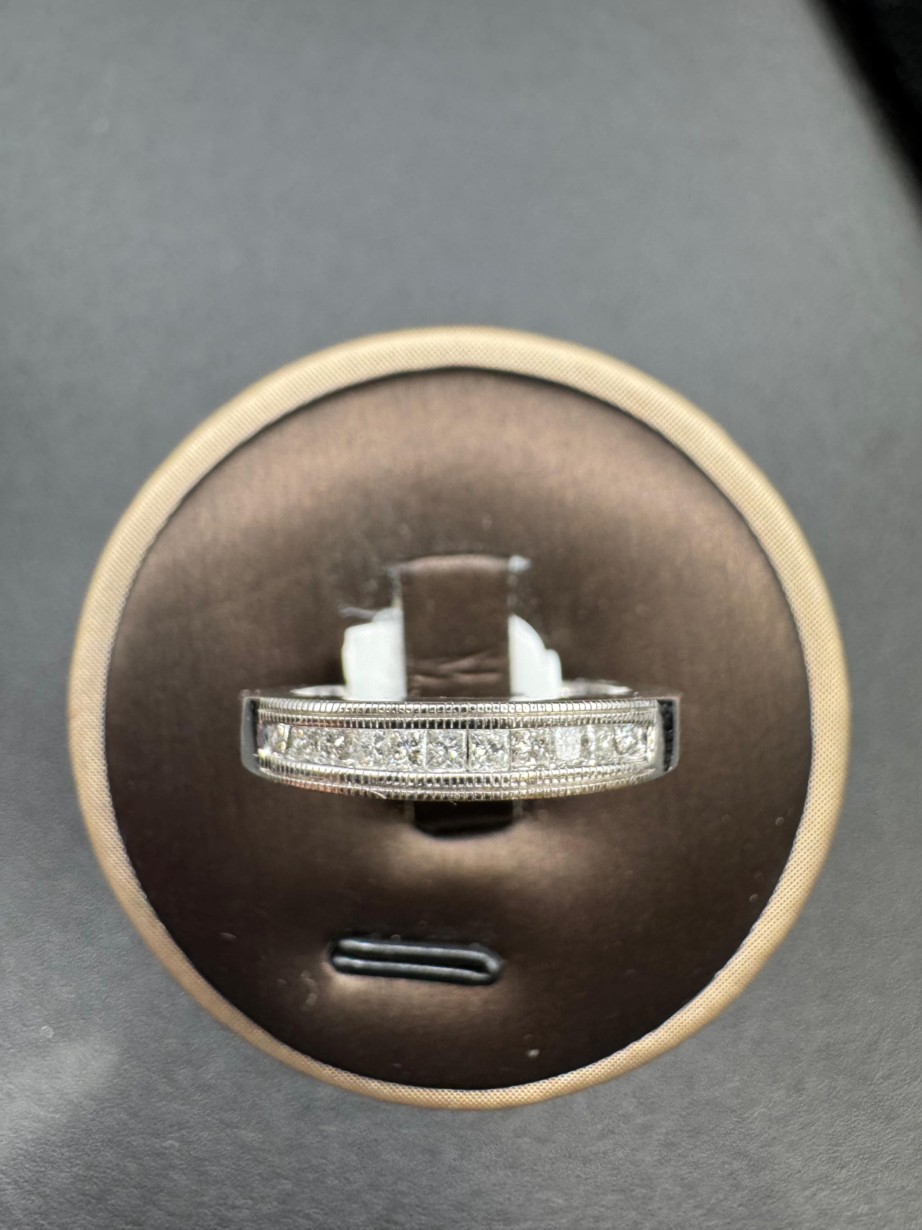 14KT White Gold 0.25CT Diamond Band.