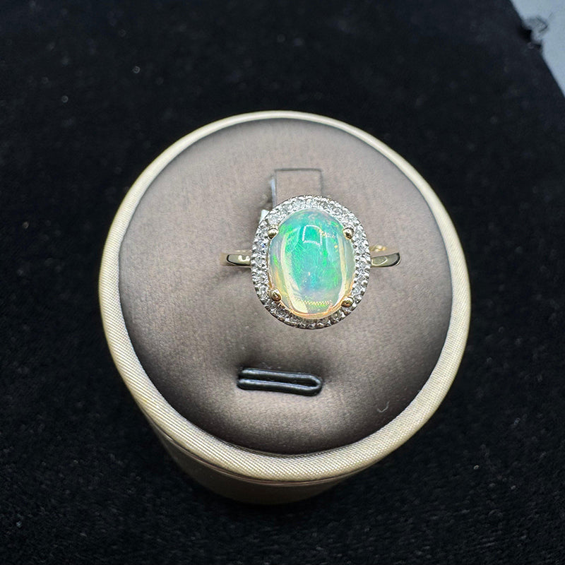 14K YELLOW GOLD 0.12 CT DIAMOND OPAL STONE RING.
